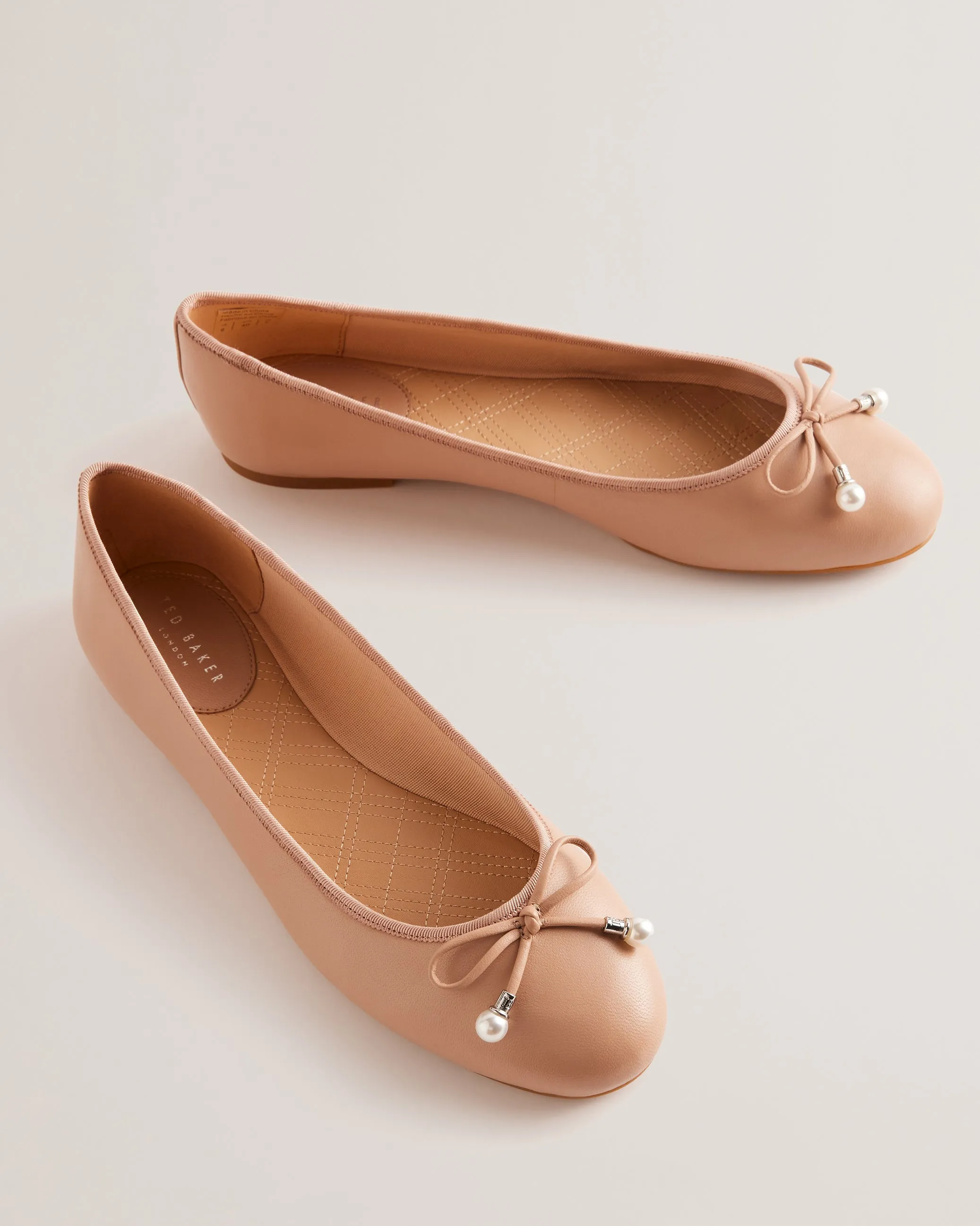 Ayvvah Flat Bow Ballerina Shoe With Signature Charm Pink