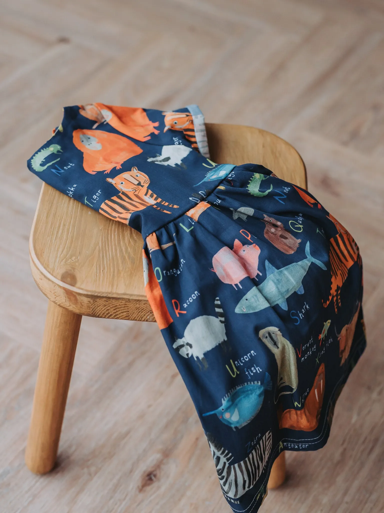 Cotton Sun Dress with twist back detail - AlphaZoo Navy