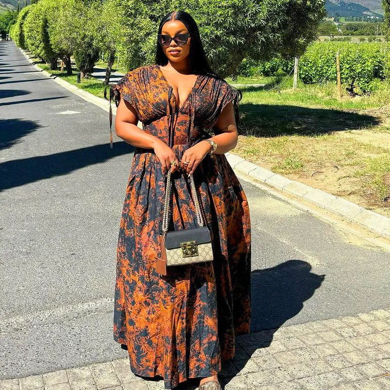 Elegant African-Inspired Print Flowing Maxi Dress with Lace-Up Detail