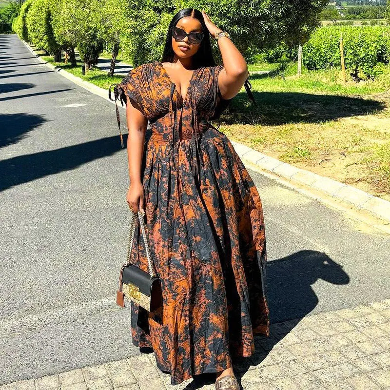 Elegant African-Inspired Print Flowing Maxi Dress with Lace-Up Detail