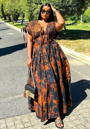Elegant African-Inspired Print Flowing Maxi Dress with Lace-Up Detail