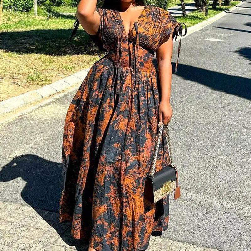 Elegant African-Inspired Print Flowing Maxi Dress with Lace-Up Detail