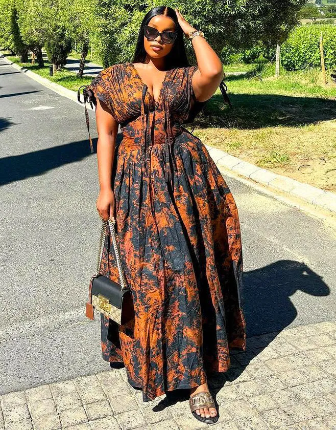 Elegant African-Inspired Print Flowing Maxi Dress with Lace-Up Detail