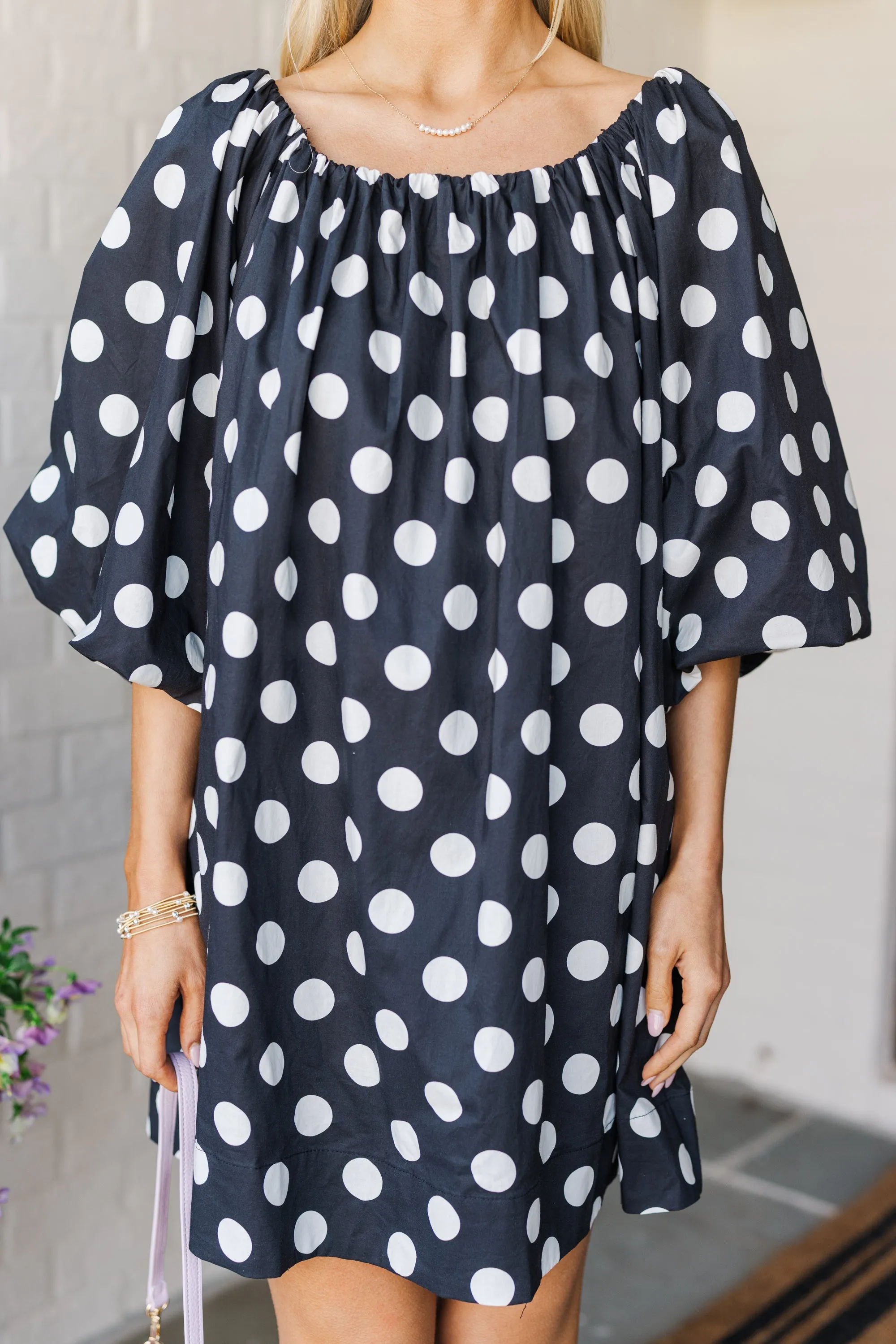 The Beyond Black Polka Dot Dress