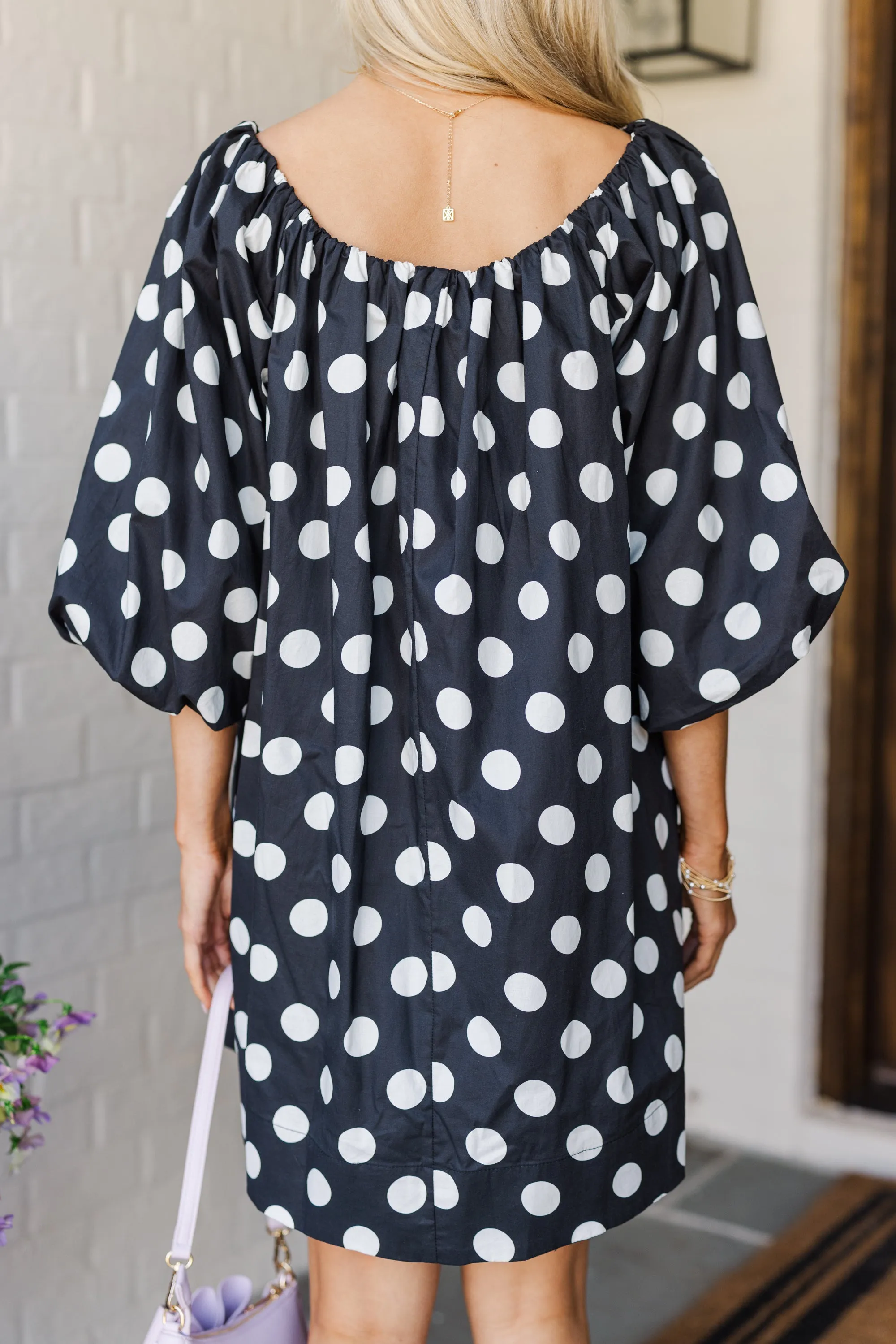 The Beyond Black Polka Dot Dress